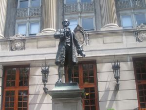 Hamilton statue at Columbia, an early American rock in the sea of finance. 